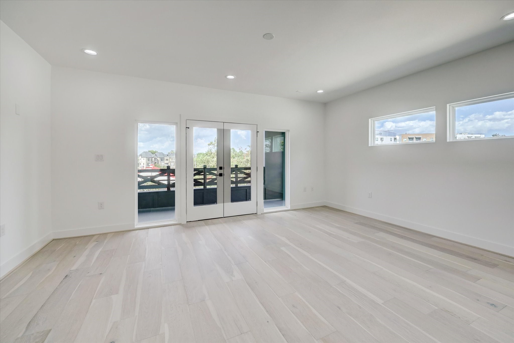 6209 Westcott Street Houston, TX 77007 - Photo 11 of 16 Game room has double French doors to a covered balcony.