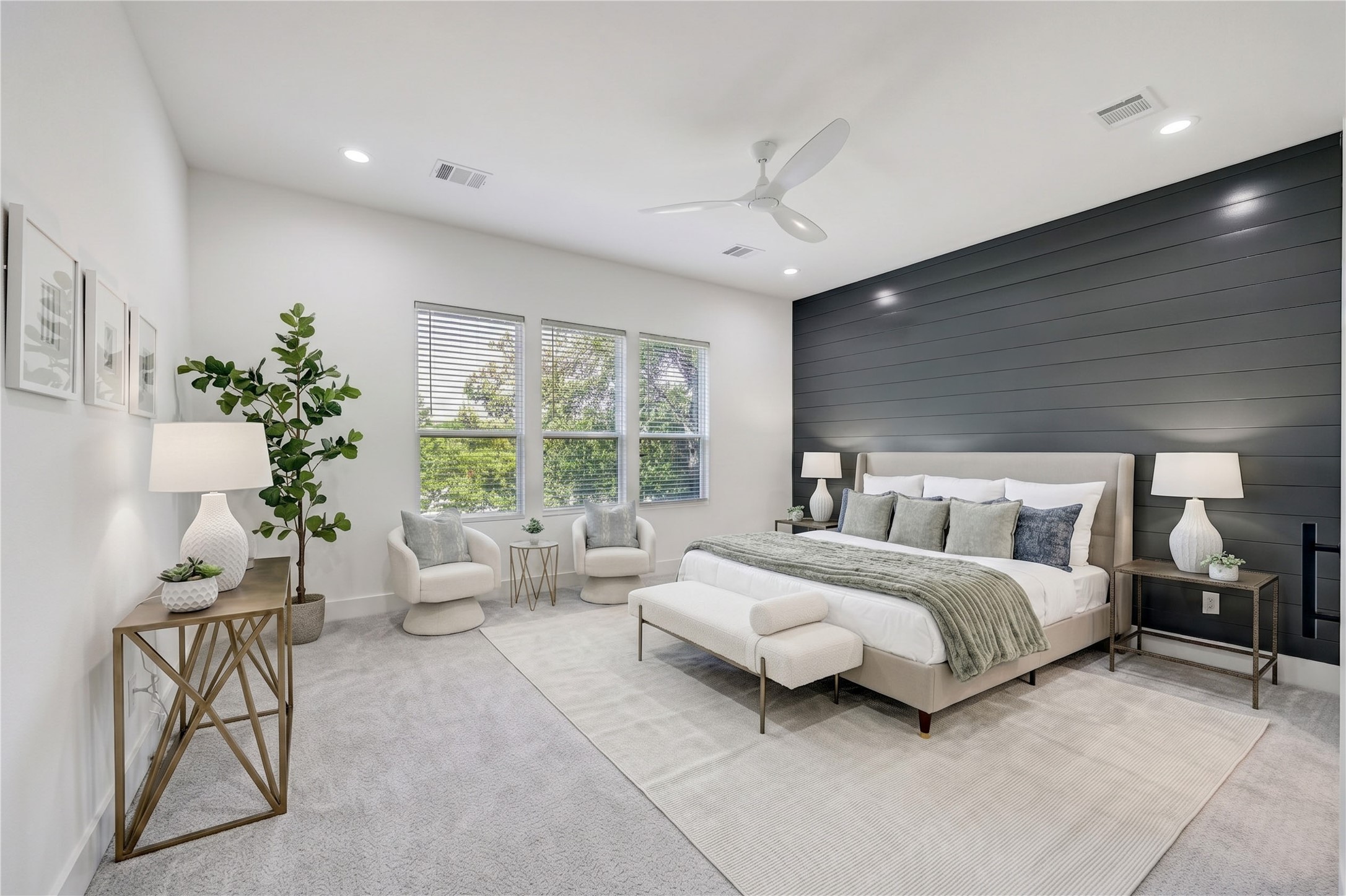 6209 Westcott Street Houston, TX 77007 - Photo 6 of 16 Primary Suite – A serene retreat featuring luxury carpeting and a statement wall.