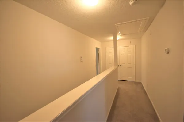 a view of a big room with wooden floor