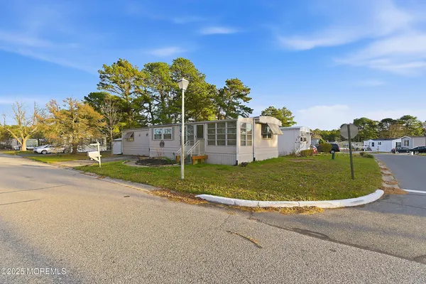 a view of a house with a park