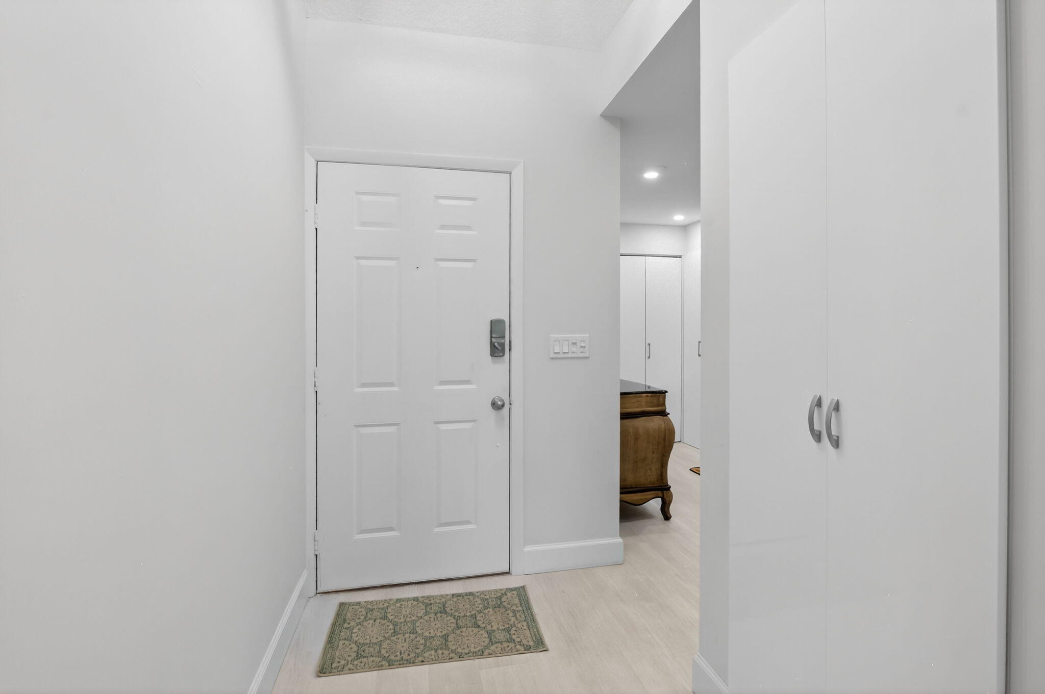 7460 La Paz Boulevard, Unit 204 Boca Raton, FL 33433 - Photo 2 of 30 foyer