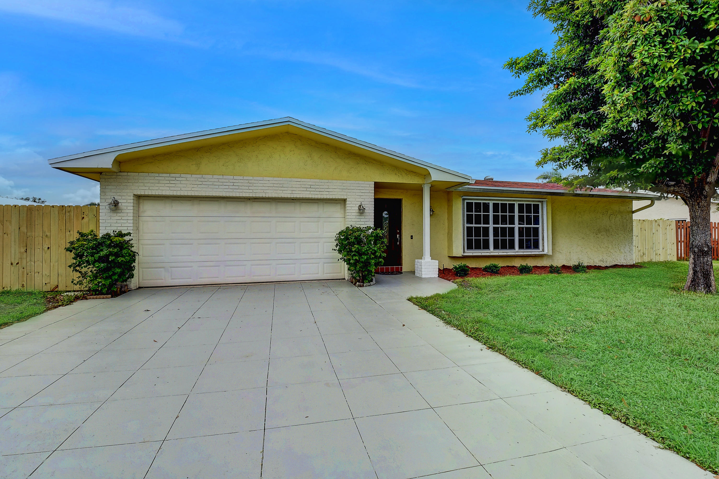 a view of outdoor space yard and garage