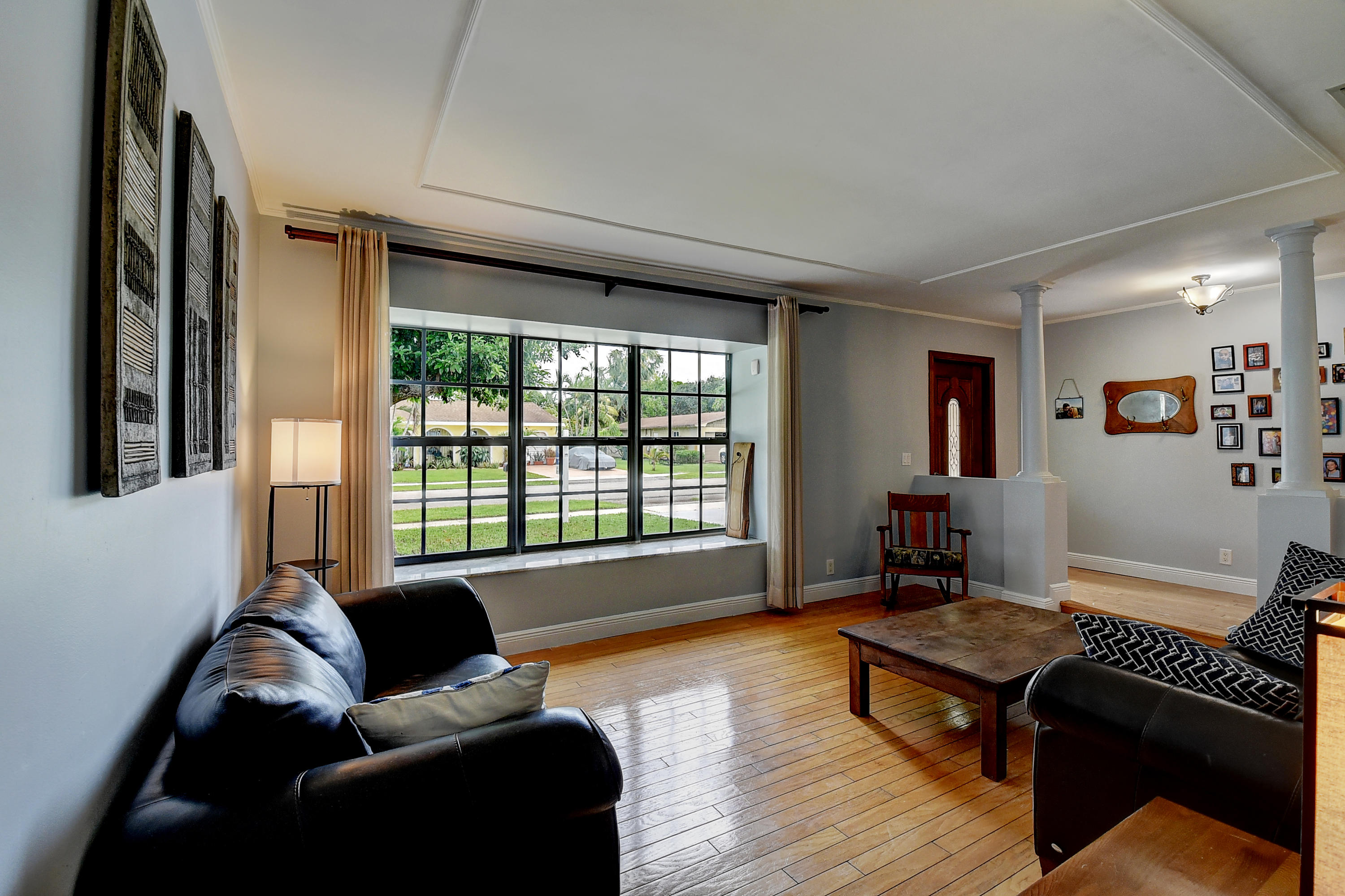 1775 Southwest 8th Street Boca Raton, FL 33486 - Photo 5 of 20 a living room with furniture and a window