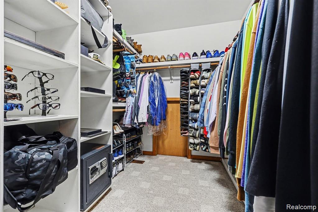 7277 Cardinal Road Algonac, MI 48001 - Photo 27 of 36 Walk in closet with light carpet