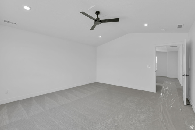 2821 Scarlet Road, Unit 149 Eagle Mountain, UT 84005 - Photo 23 of 28 Vaulted primary bedroom featuring LED lighting, contemporary ceiling fan, looking out to bedroom entrance.