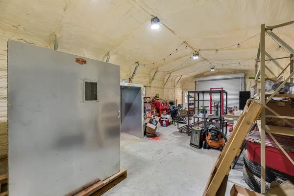 a room with gym equipment and equipment