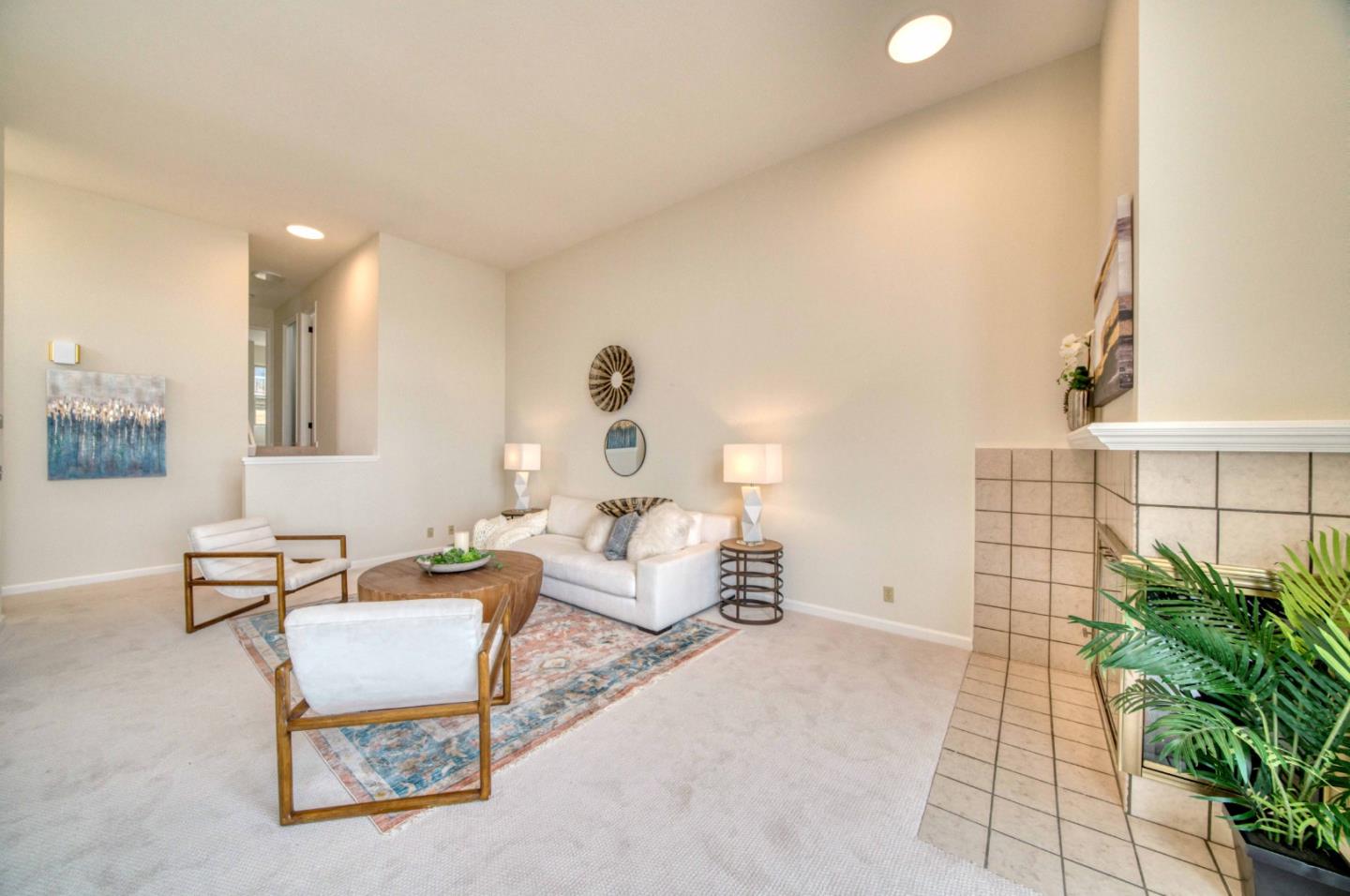 457 Roberts Road Pacifica, CA 94044 - Photo 12 of 29 a living room with furniture and a potted plant