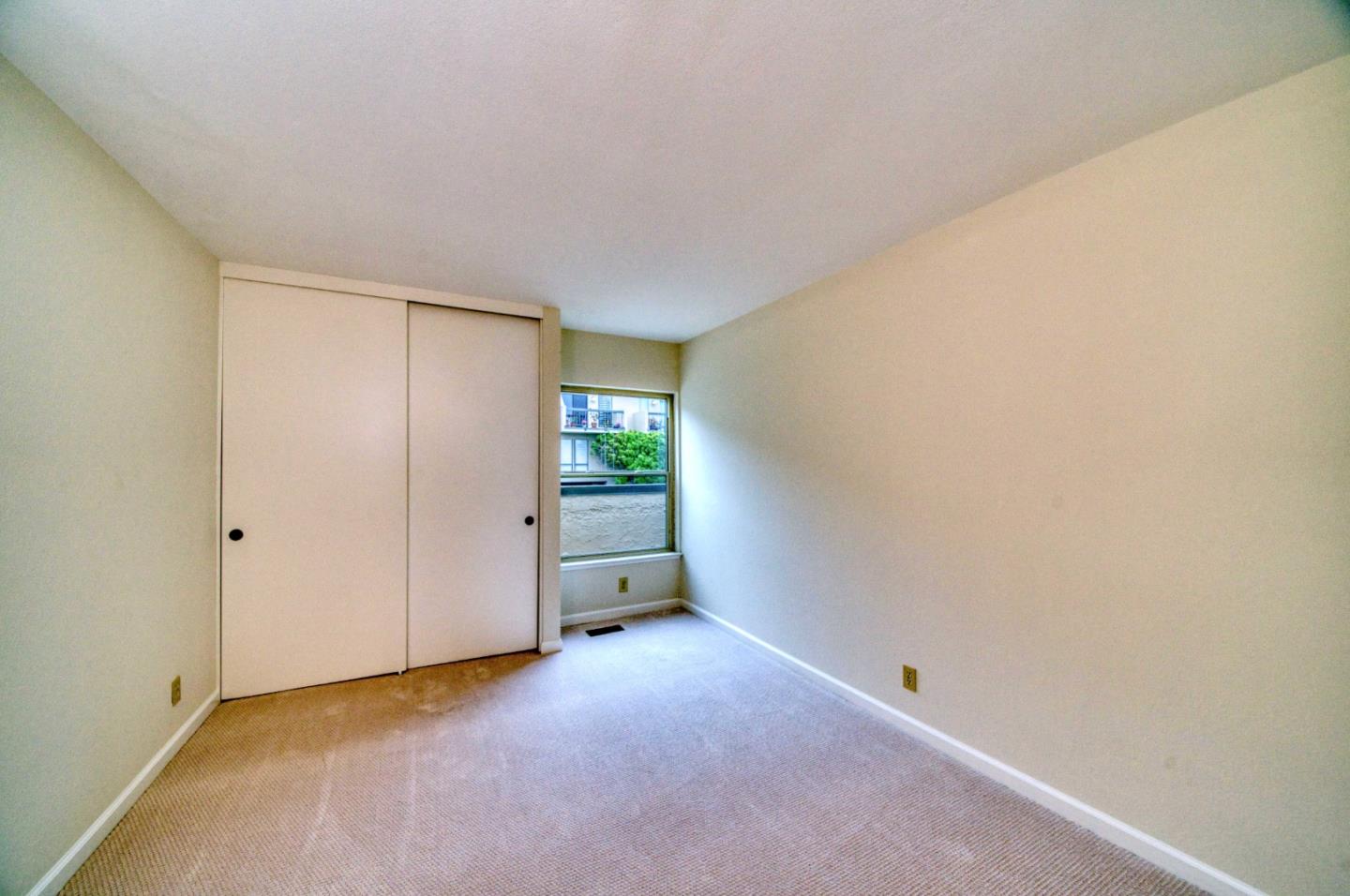 457 Roberts Road Pacifica, CA 94044 - Photo 18 of 29 a view of an empty room and a window