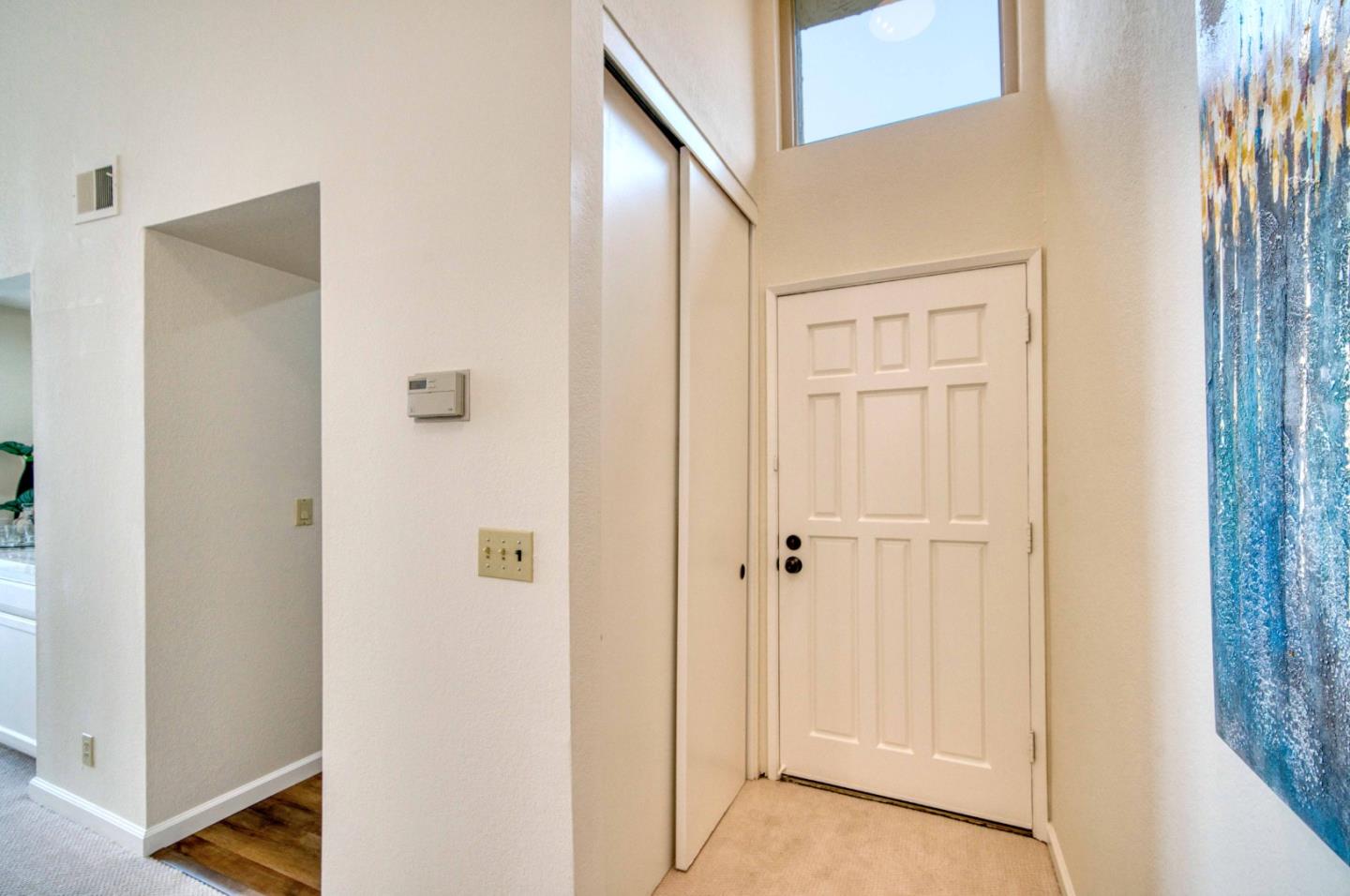 457 Roberts Road Pacifica, CA 94044 - Photo 2 of 29 a view of a hallway with wooden floor