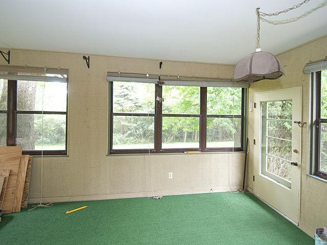 2748 North Maple Road Ann Arbor, MI 48103 - Photo 7 of 17 Three-season porch.