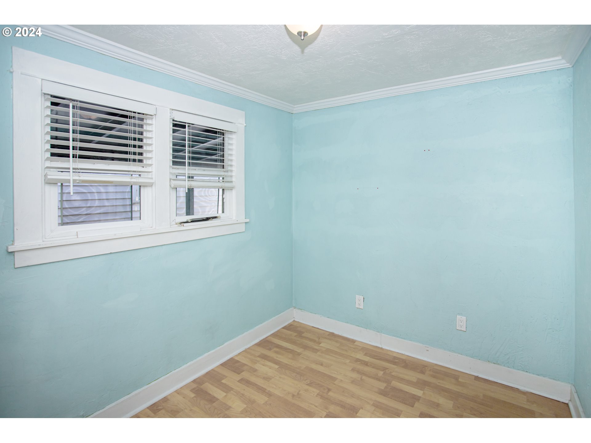 1975 Emerald Street Eugene, OR 97403 - Photo 16 of 19 a view of an empty room with a window