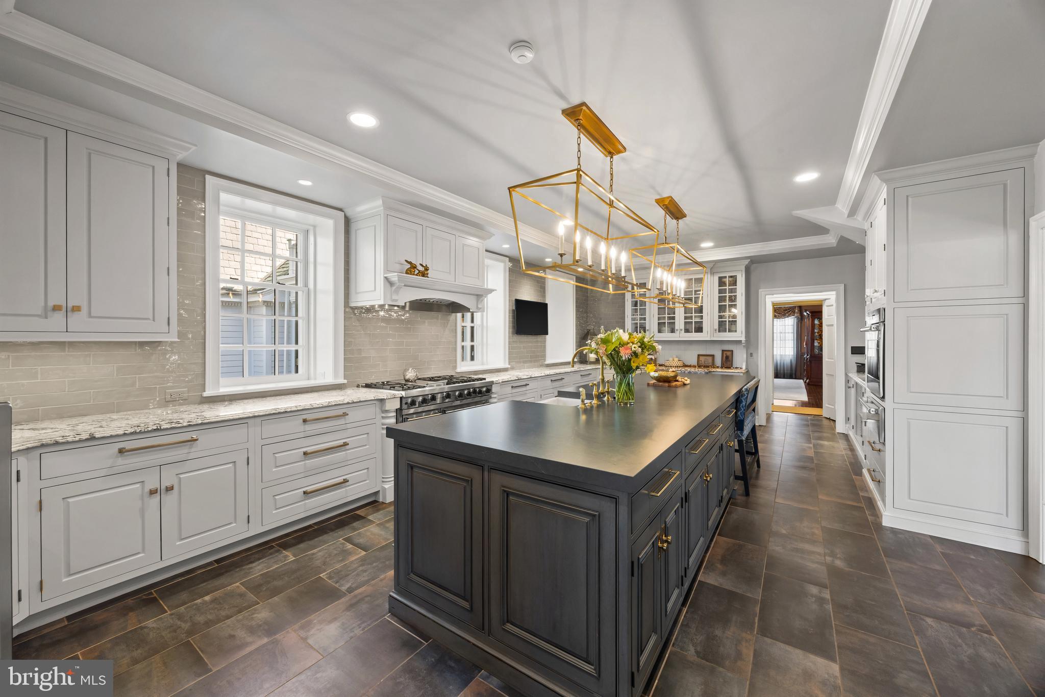 2734 Caves Road Owings Mills, MD 21117 - Photo 12 of 22 a kitchen with counter top space sink and a stove