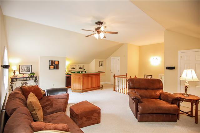 7324 Snow Mangrum Road Fairview, TN 37062 - Photo 14 of 20 Only 6 steps from the kitchen is this fabulous bonus room (17x23) featuring wet bar, surround sound, tons of storage, and a vaulted ceiling. This will be a favorite game room, media room, studio or play room.