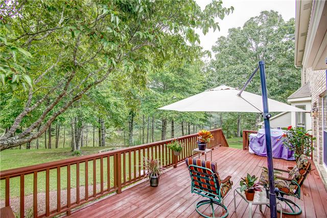 7324 Snow Mangrum Road Fairview, TN 37062 - Photo 2 of 20 Fabulous over-sized deck overlooking the lake. So private. So peaceful. A special place for early morning coffee, lively social gatherings, or quiet star-gazing moments.