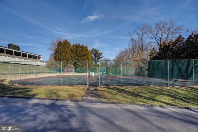 a living room with furniture a window and a fireplace