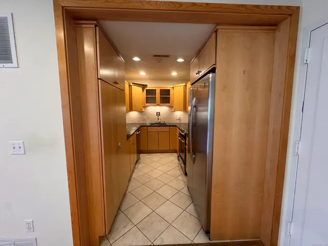 a view of a hallway view with couch