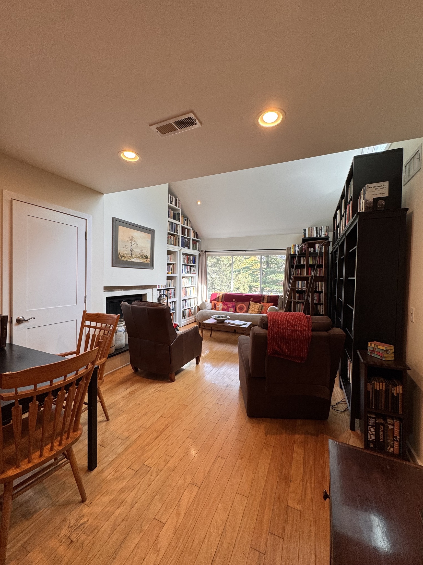 301 Post Road East, Unit 8 Westport, CT 06880 - Photo 6 of 18 a living room with furniture and a flat screen tv