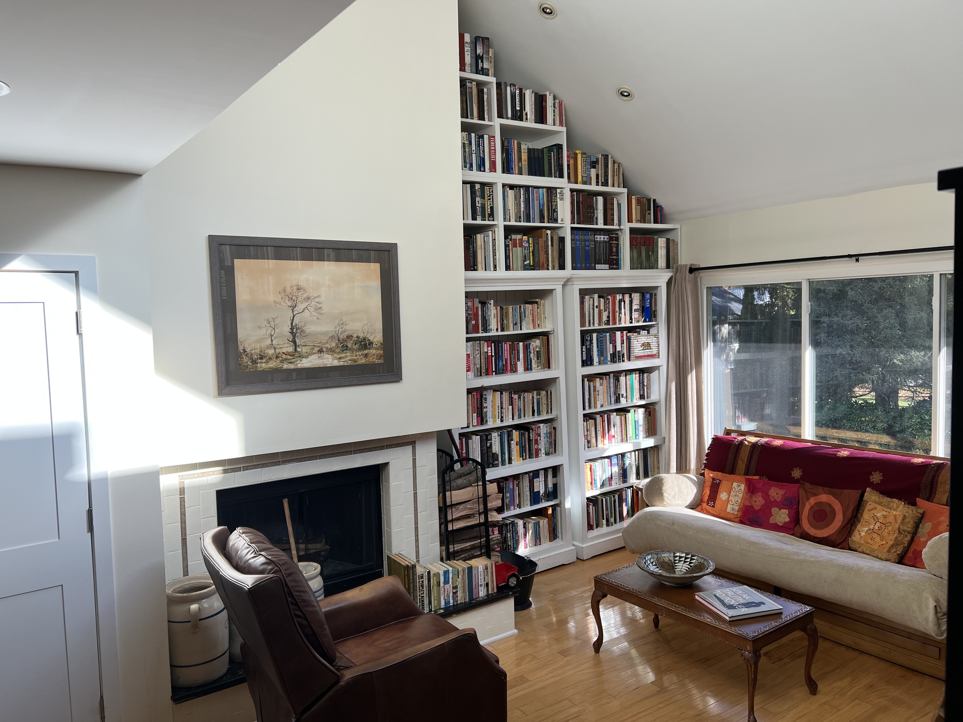 301 Post Road East, Unit 8 Westport, CT 06880 - Photo 9 of 18 a living room with furniture and a book shelf