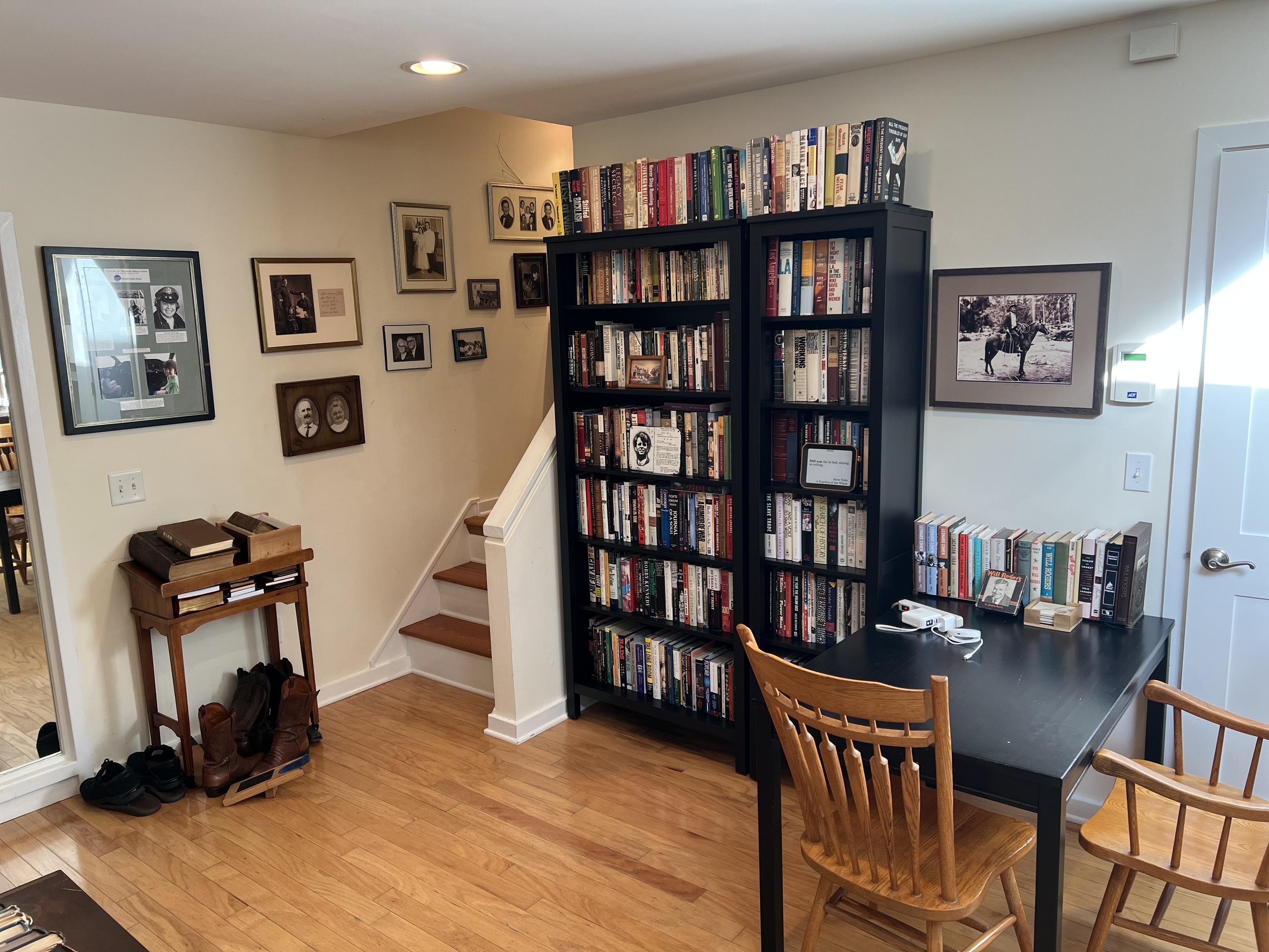 301 Post Road East, Unit 8 Westport, CT 06880 - Photo 10 of 18 a view of a workspace with furniture and book shelf
