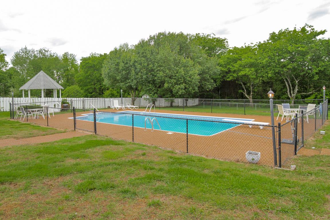 283 Lee Road Cottontown, TN 37048 - Photo 22 of 29 a view of a backyard with swimming pool