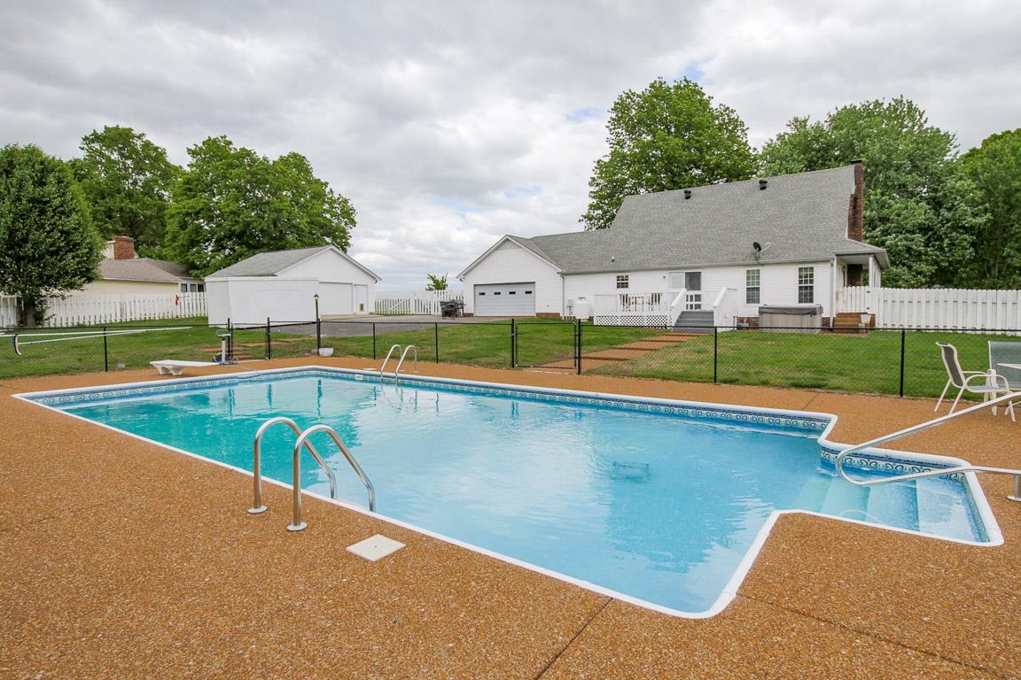 283 Lee Road Cottontown, TN 37048 - Photo 26 of 29 swimming pool with outdoor seating and yard