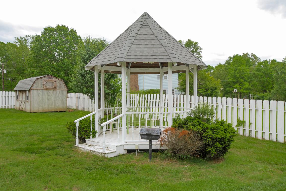 283 Lee Road Cottontown, TN 37048 - Photo 27 of 29 a house view with a garden space