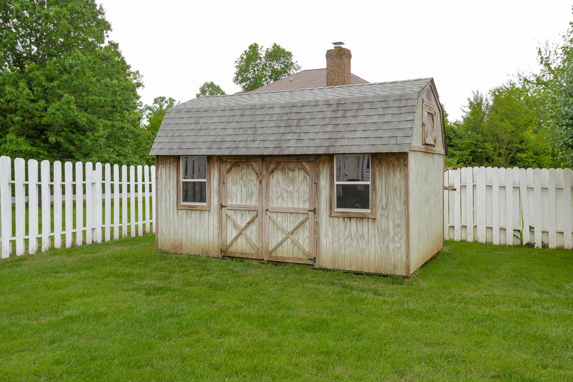 283 Lee Road Cottontown, TN 37048 - Photo 29 of 29 a front view of a house with garden