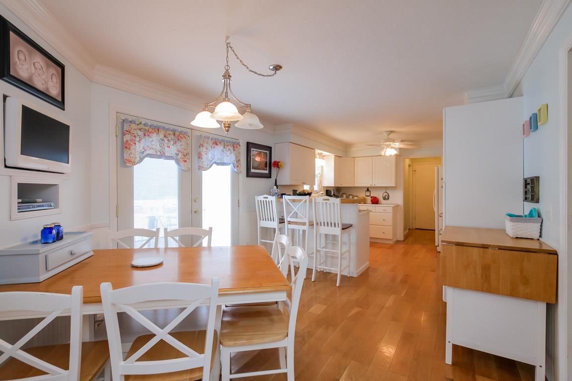 283 Lee Road Cottontown, TN 37048 - Photo 8 of 29 a view of a dining room with furniture and wooden floor