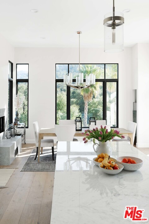 3170 Santa Maria Road Topanga, CA 90290 - Photo 23 of 60 a very nice looking living room with furniture and a large window