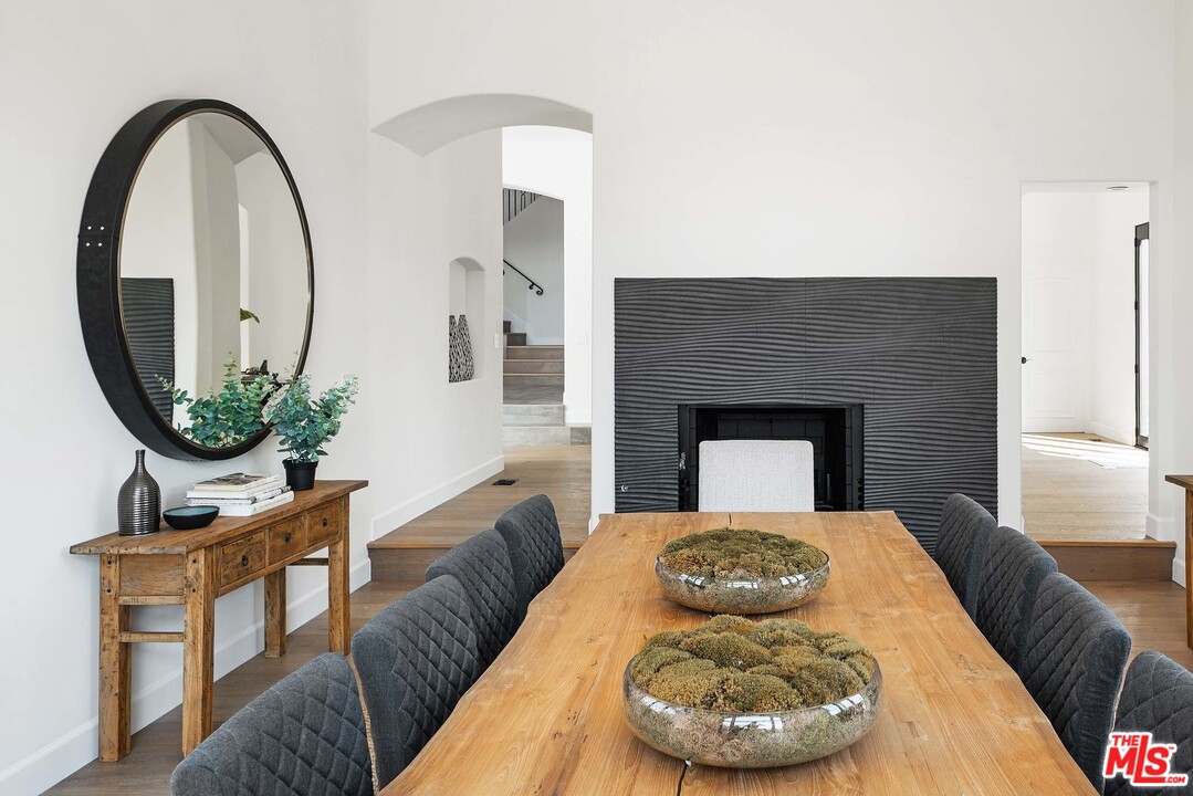 3170 Santa Maria Road Topanga, CA 90290 - Photo 28 of 60 a living room with furniture and a fireplace