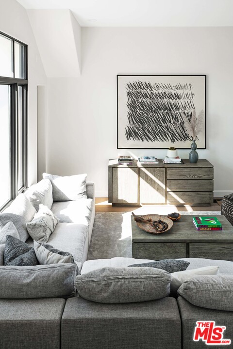 3170 Santa Maria Road Topanga, CA 90290 - Photo 31 of 60 a living room with furniture and a rug