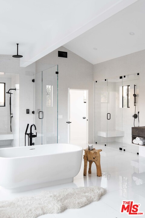 3170 Santa Maria Road Topanga, CA 90290 - Photo 40 of 60 a living room with kitchen island furniture and a large window