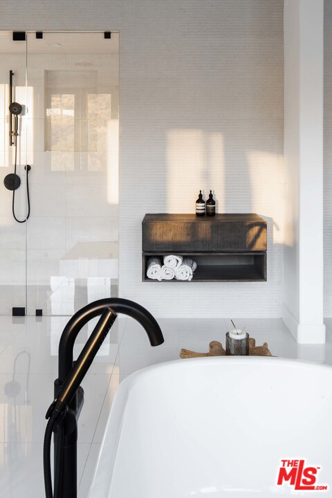 3170 Santa Maria Road Topanga, CA 90290 - Photo 41 of 60 a bedroom with a bed and a dresser