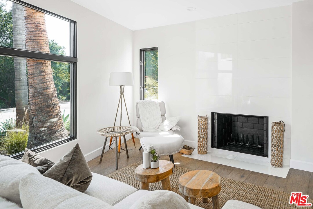 3170 Santa Maria Road Topanga, CA 90290 - Photo 43 of 60 a living room with furniture and a flat screen tv