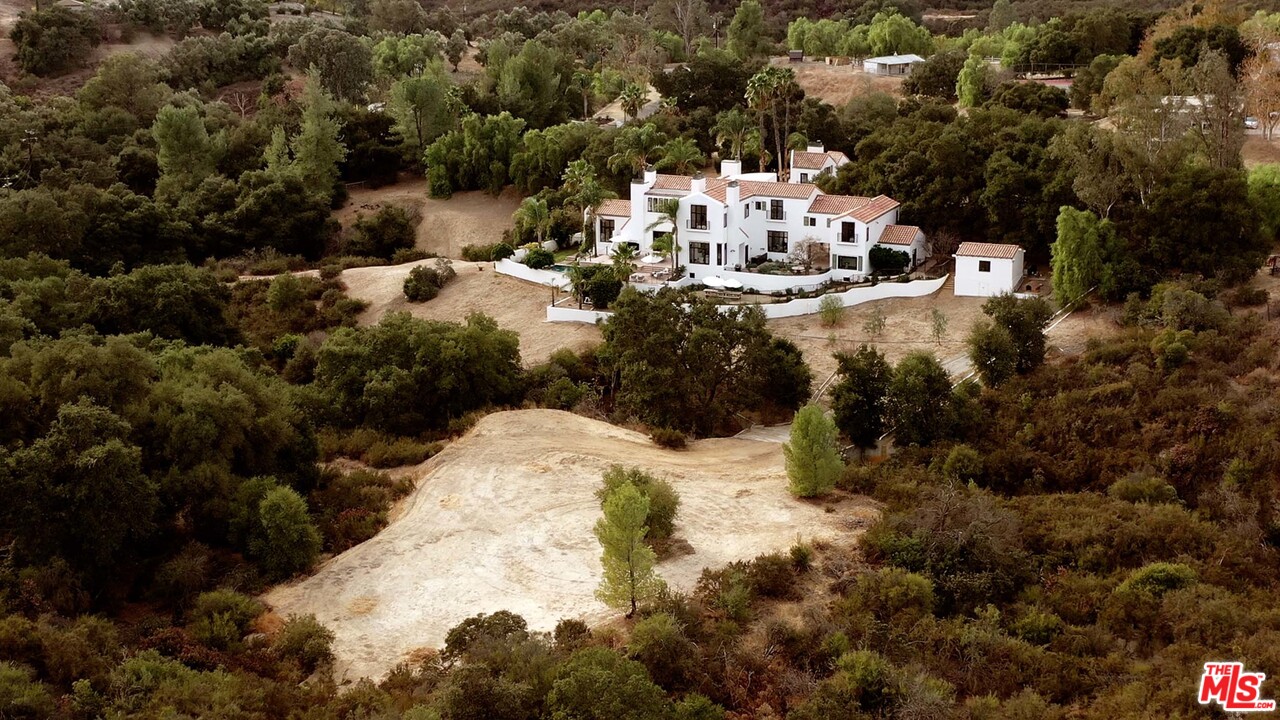 3170 Santa Maria Road Topanga, CA 90290 - Photo 52 of 60 a view of a houses with yard