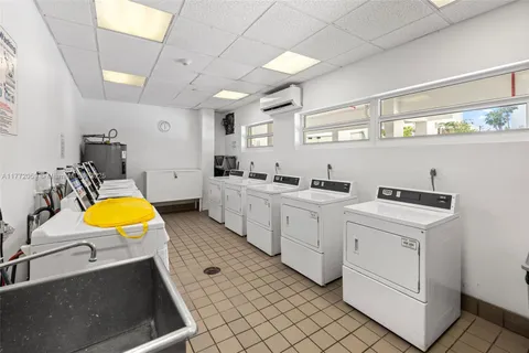 a view of a kitchen with appliances and cabinets