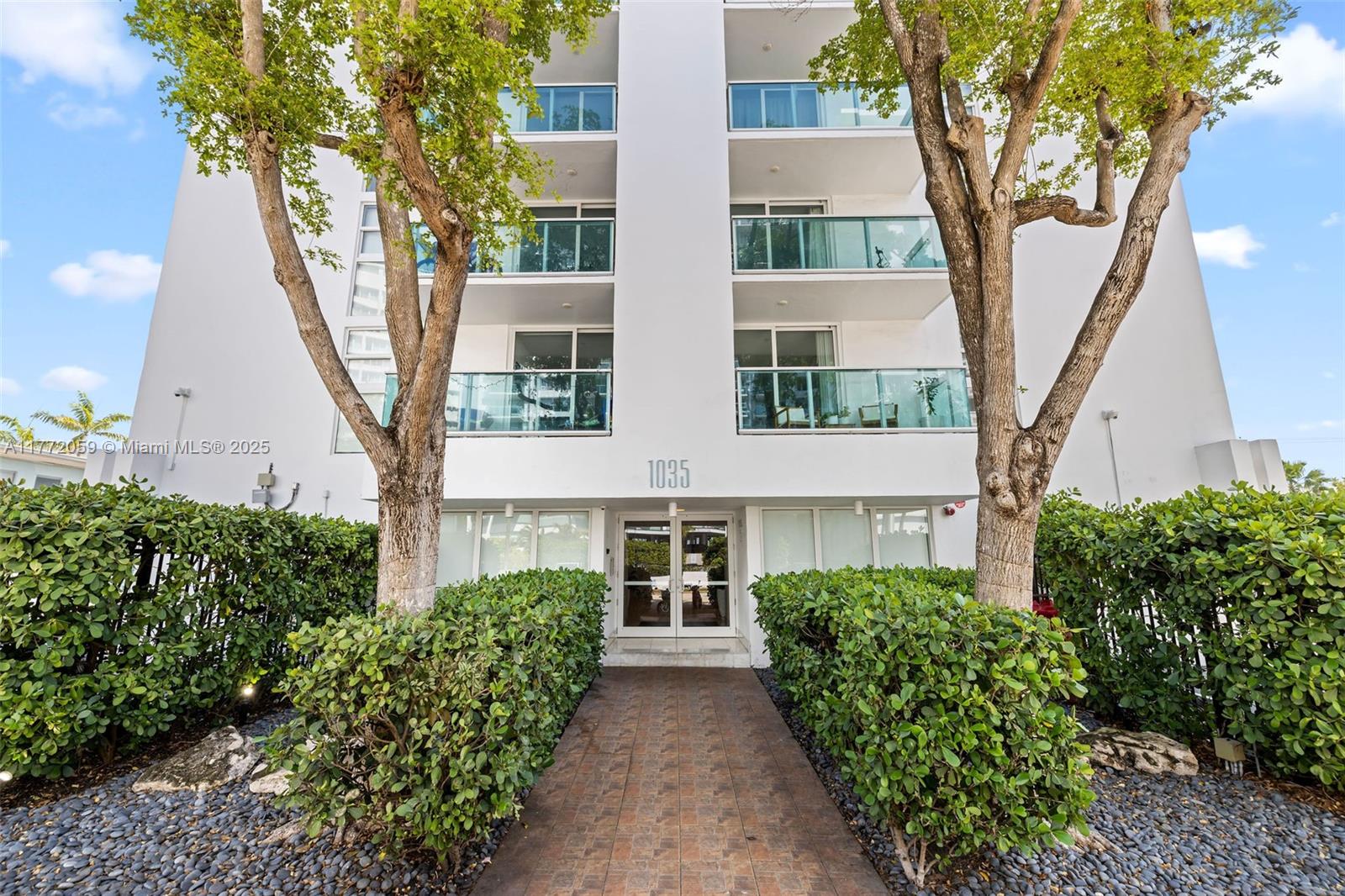 1035 West Avenue, Unit 507 Miami Beach, FL 33139 - Photo 2 of 22 front view of a multi story residential apartment building