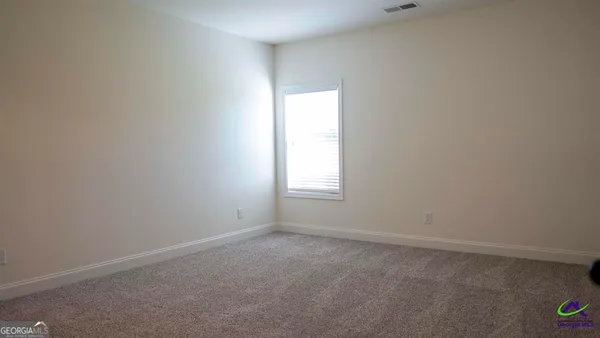 a bathroom with a sink and vanity