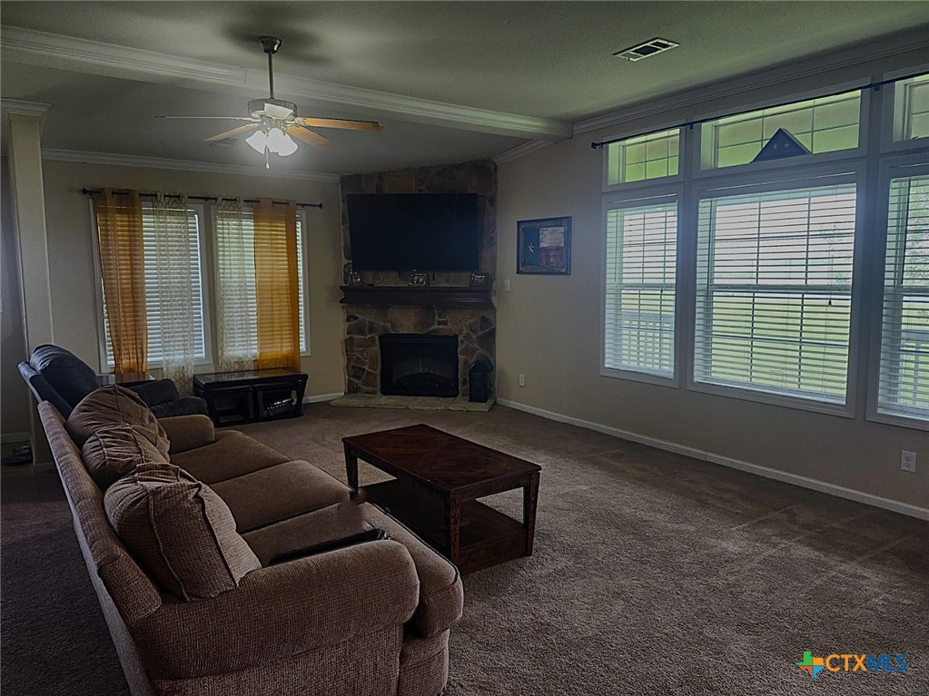 1845 Royal Road Port Lavaca, TX 77979 - Photo 2 of 22 a living room with furniture and a fireplace