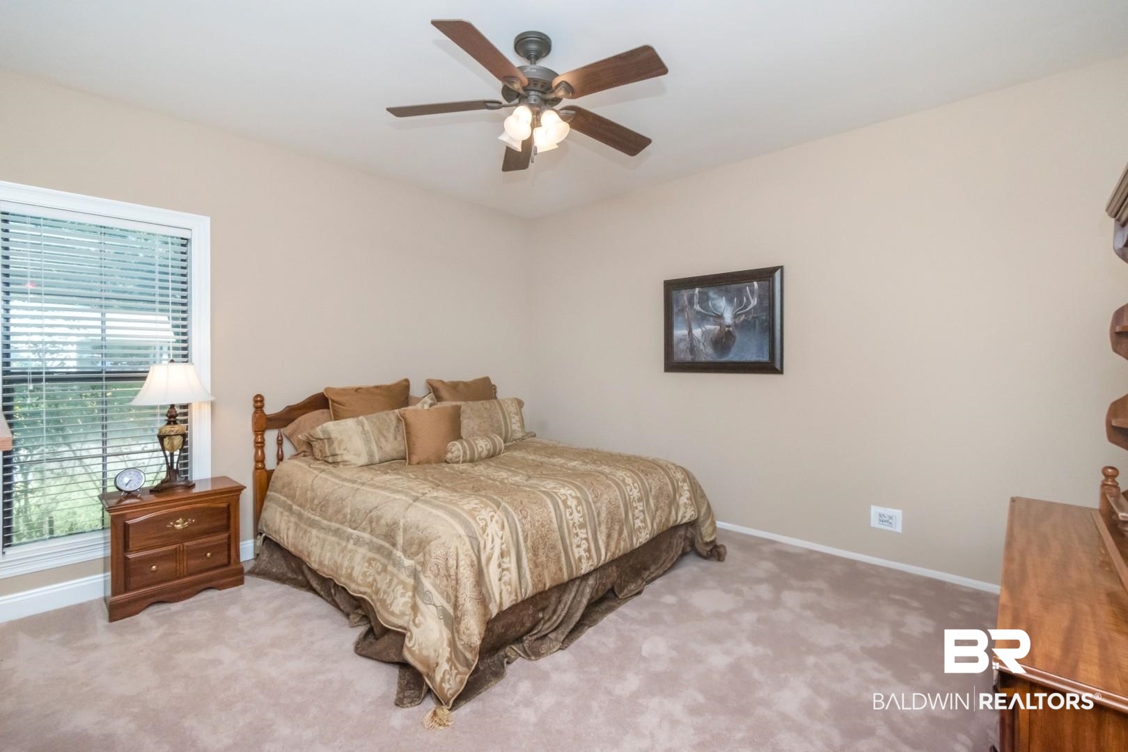 1360 Dykes Road North Mobile, AL 36608 - Photo 23 of 40 Carpeted bedroom with a ceiling fan and baseboards