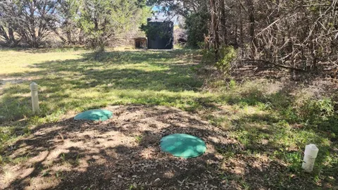 a view of a yard with an outdoor space