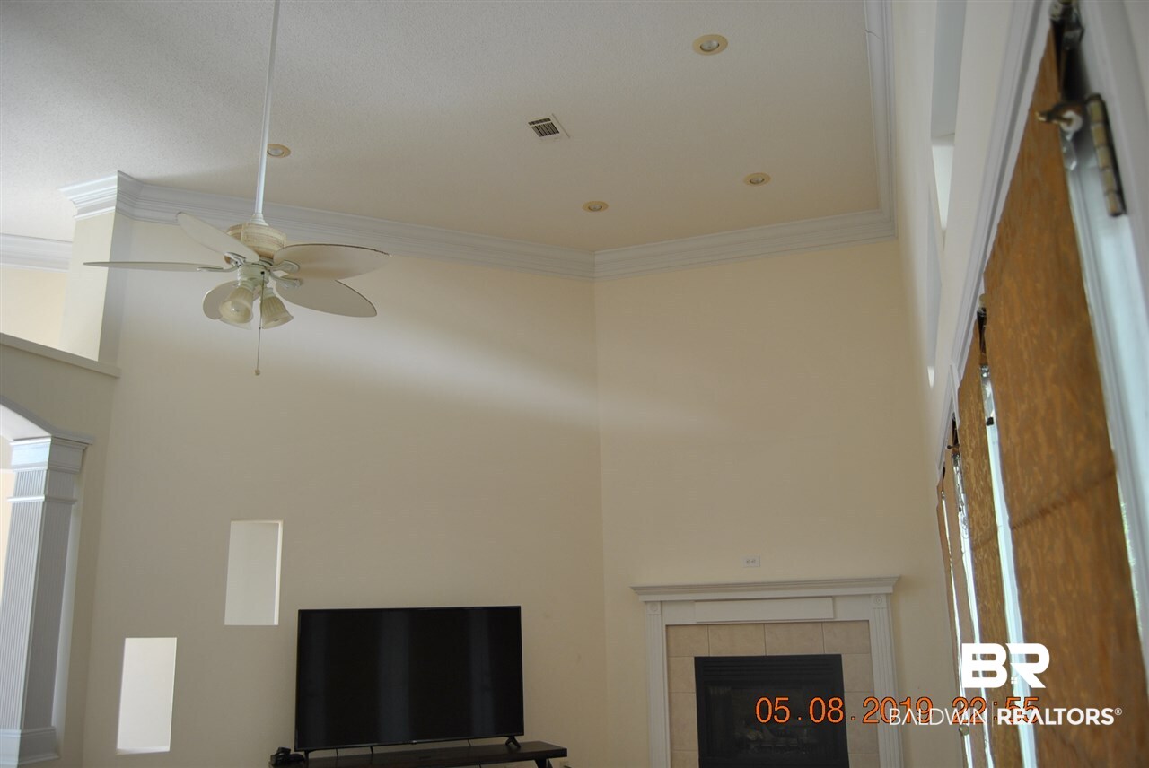 411 Juniper Creek Road Brewton, AL 36426 - Photo 26 of 35 Large den looks over patio