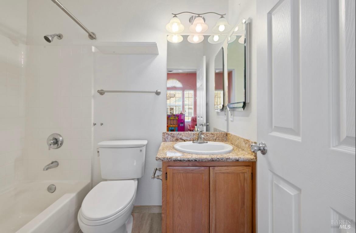 605 Laurel Grove Circle Santa Rosa, CA 95407 - Photo 13 of 29 a bathroom with a sink toilet vanity and shower