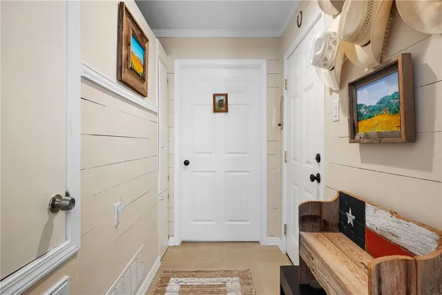 a bathroom with a granite countertop sink toilet a mirror a vanity and shower