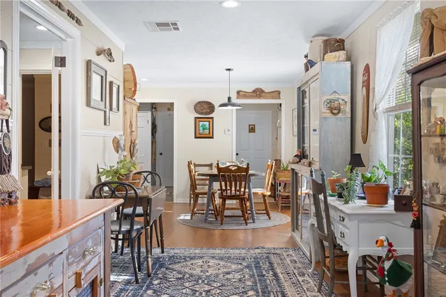 a bedroom with a bed and dresser