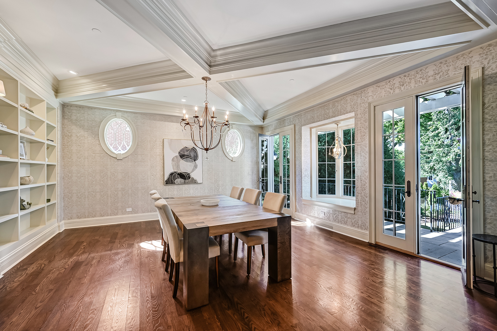 4736 Grand Avenue Western Springs, IL 60558 - Photo 11 of 69 a dining room with wooden floor a chandelier a wooden table and chairs