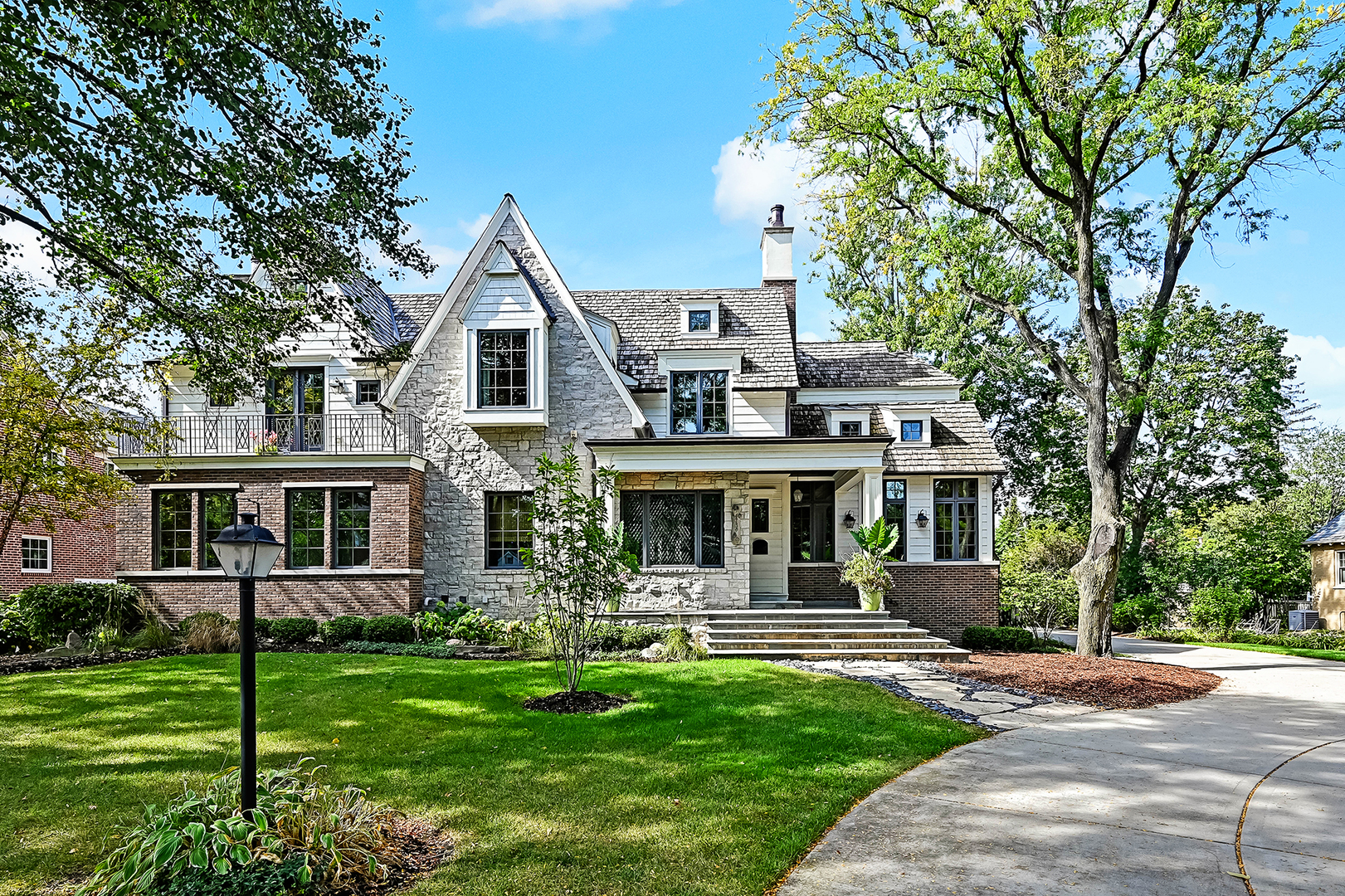 4736 Grand Avenue Western Springs, IL 60558 - Photo 2 of 69 front view of a house with a yard