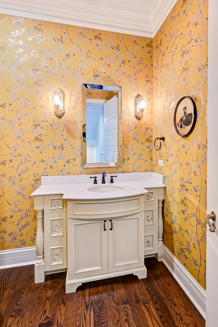 4736 Grand Avenue Western Springs, IL 60558 - Photo 24 of 69 a bathroom with a sink and a mirror