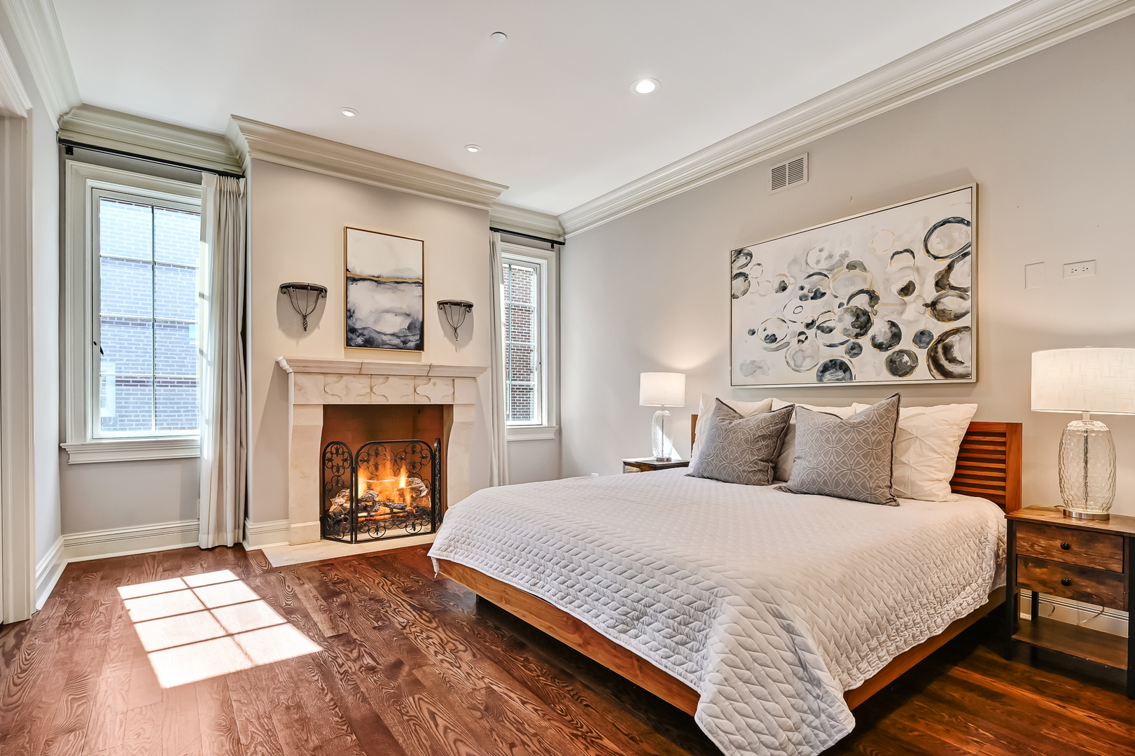 4736 Grand Avenue Western Springs, IL 60558 - Photo 26 of 69 a bedroom with a bed and a fireplace