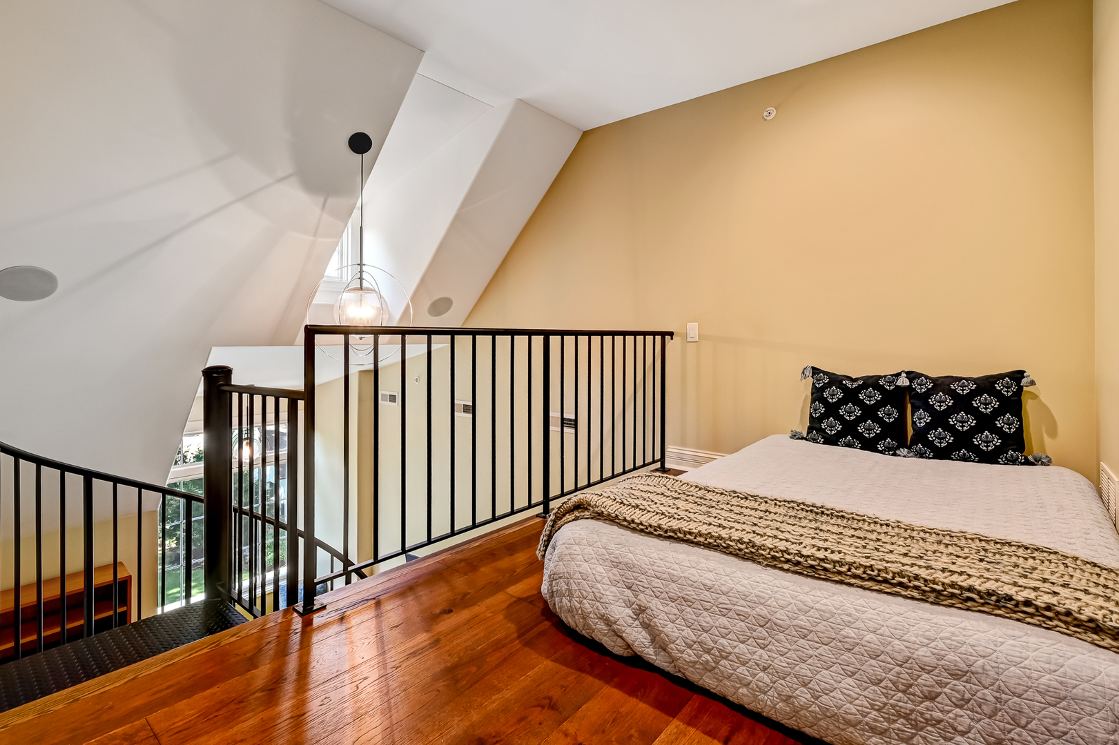 4736 Grand Avenue Western Springs, IL 60558 - Photo 39 of 69 a bed sitting in a bedroom next to a bathroom